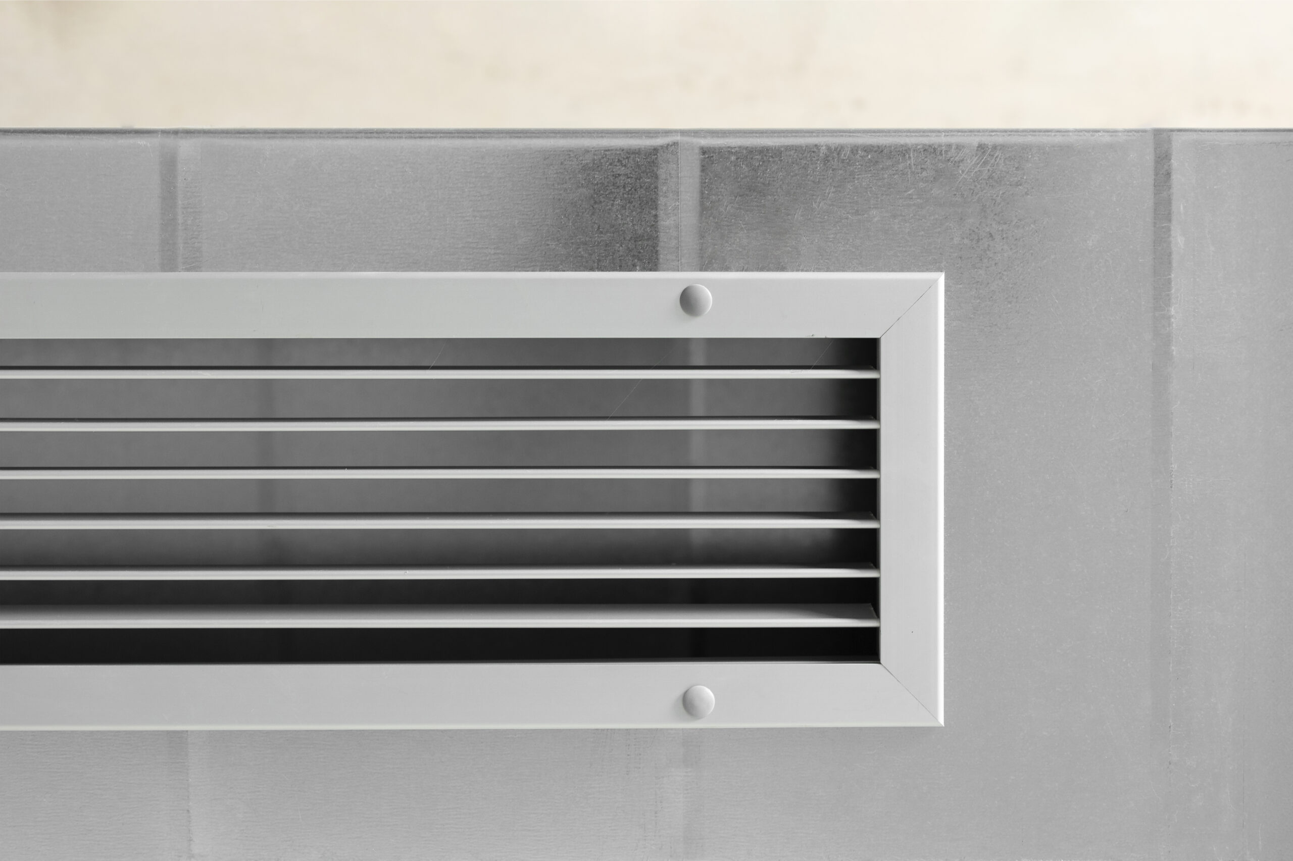 Technician performing air duct cleaning in a Los Angeles home